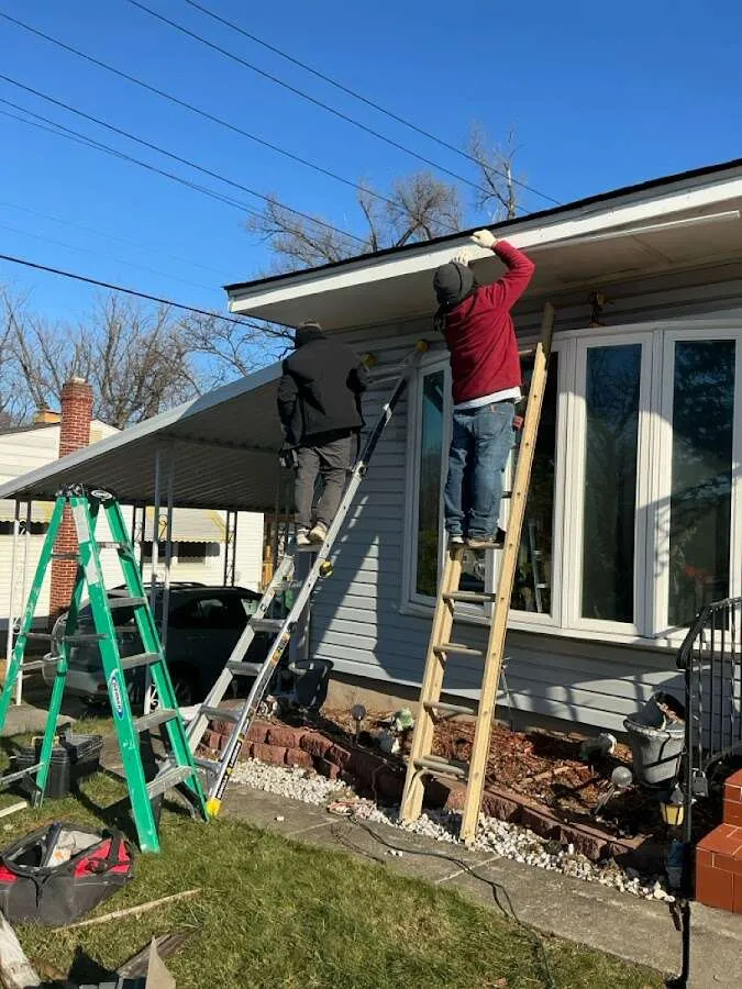 Restoration crew performing exterior repair in Norton
