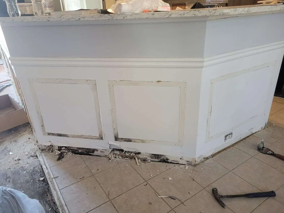 Water damage and mold on kitchen during Storm Damage Restoration in Norton